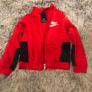 Nike zip up toddler shirt.